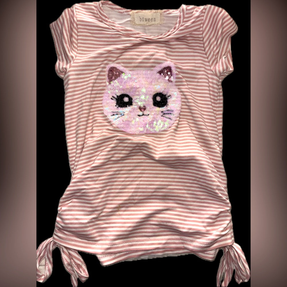 Between brand size 5y girls too super cute perfect for anytime bow tied bottom!!